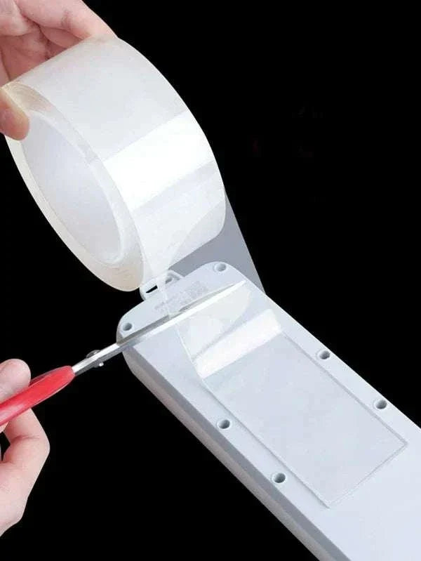 Double sided reusable tape demonstrating strong multi-surface adhesive and easy use for heavy-duty tasks