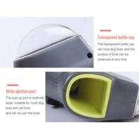 dog catching treat launched from pet treat launcher toy