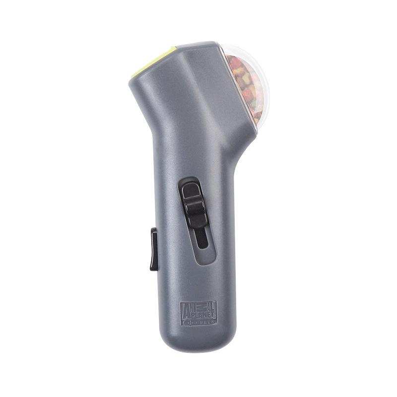 Dog catching treat launched from Pet Treat Launcher toy