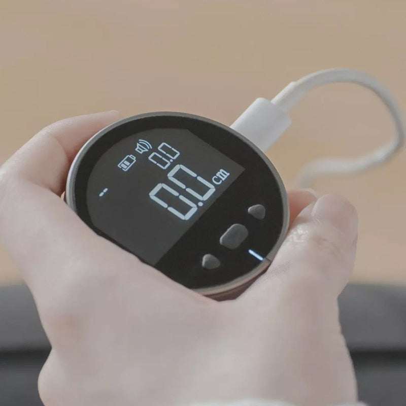 Digital measurement tape device showing extreme accuracy in measuring straight, spherical, and corner surfaces.
