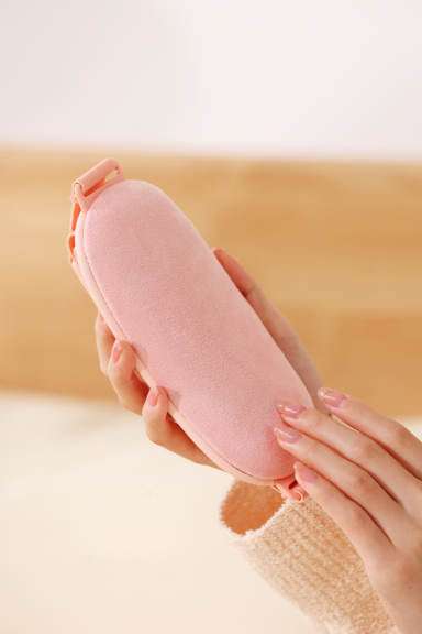 Compact rechargeable menstrual massager for pain relief during periods