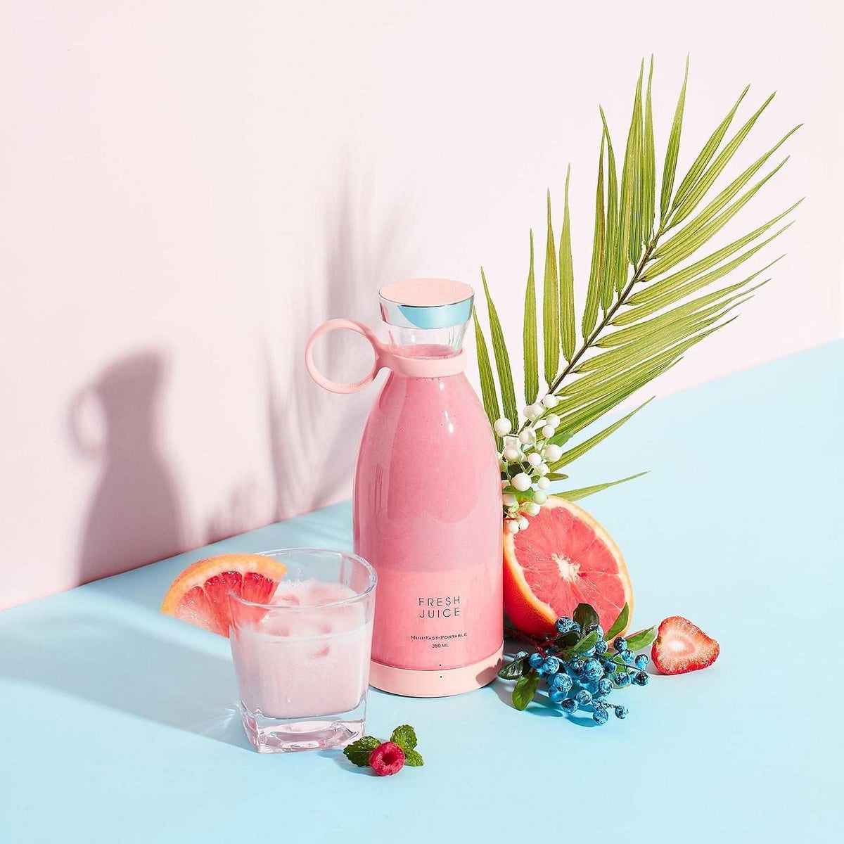 Sleek portable Blender Bottle blending fresh smoothie on the go