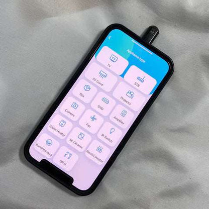 Compact infrared phone adapter device for remote control of multiple electronics