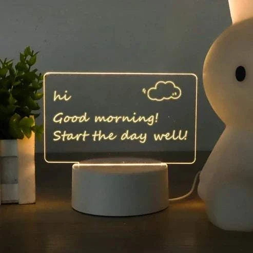 Black LED note board with colorful handwritten notes and drawings illuminated on its surface