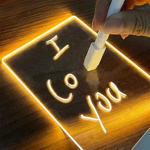 LED Note Board displaying colorful handwritten notes and drawings on a black illuminated surface