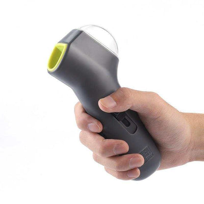 Dog catching treat launched from Pet Treat Launcher toy